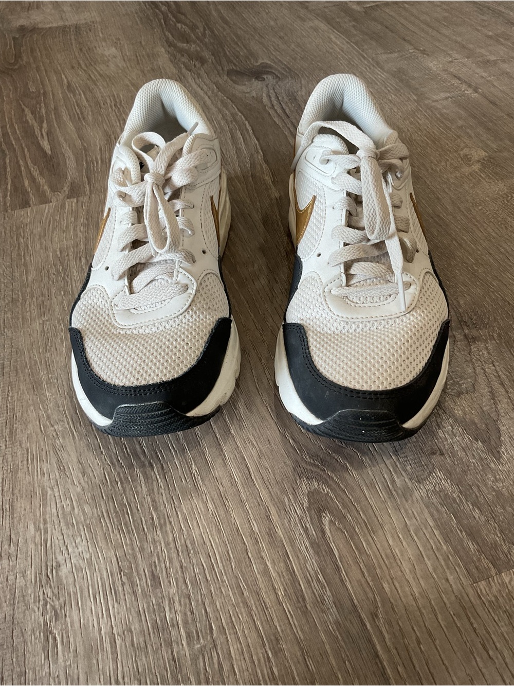 Nike White Mesh Sneakers with Black Swoosh Accent